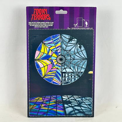 Packaged product with colorful spider web design on a white background
