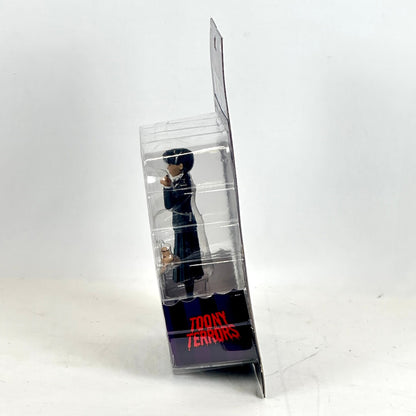 Toy figure in a transparent packaging with 'Toony Terrors' branding on a white background