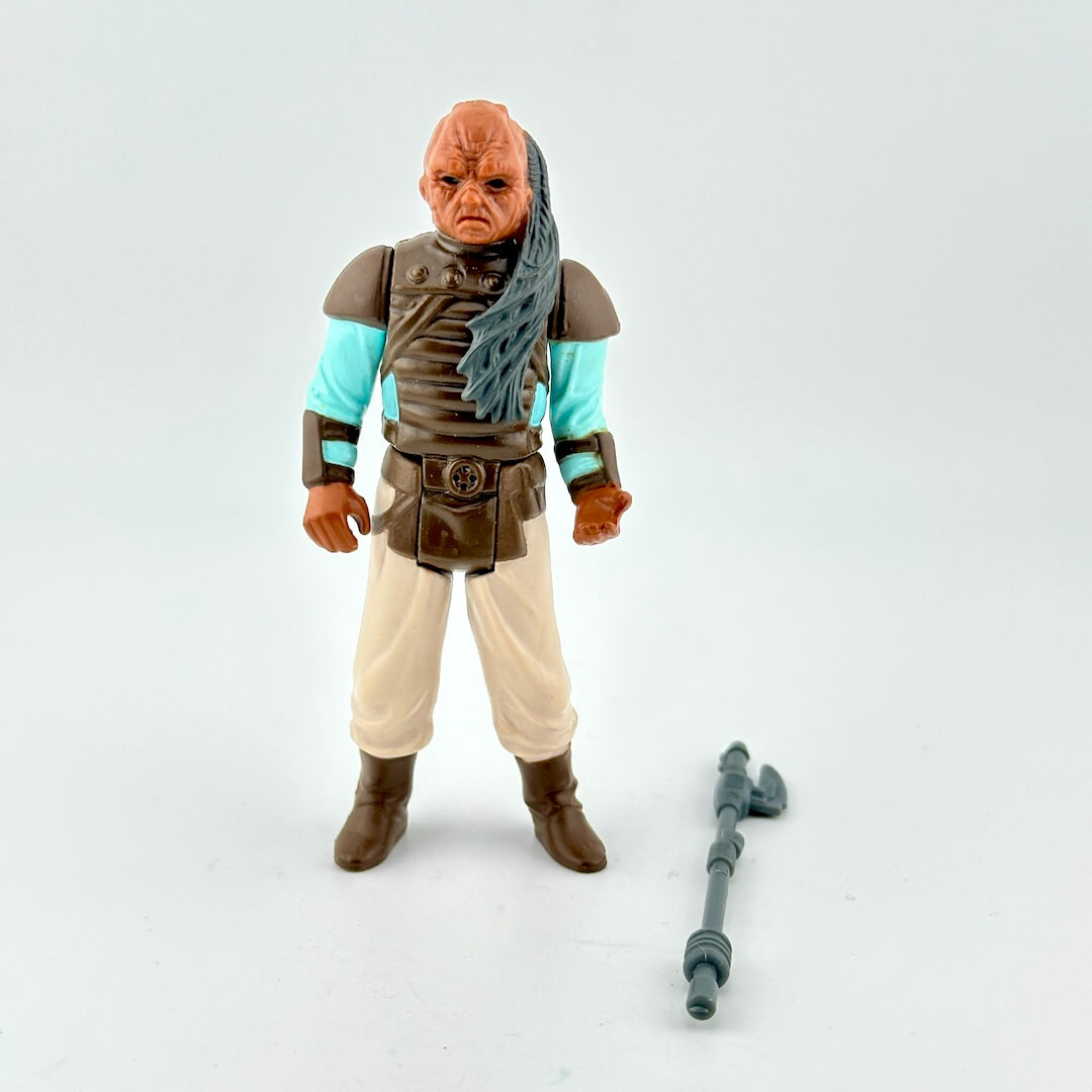 Action figure with a staff on a white background