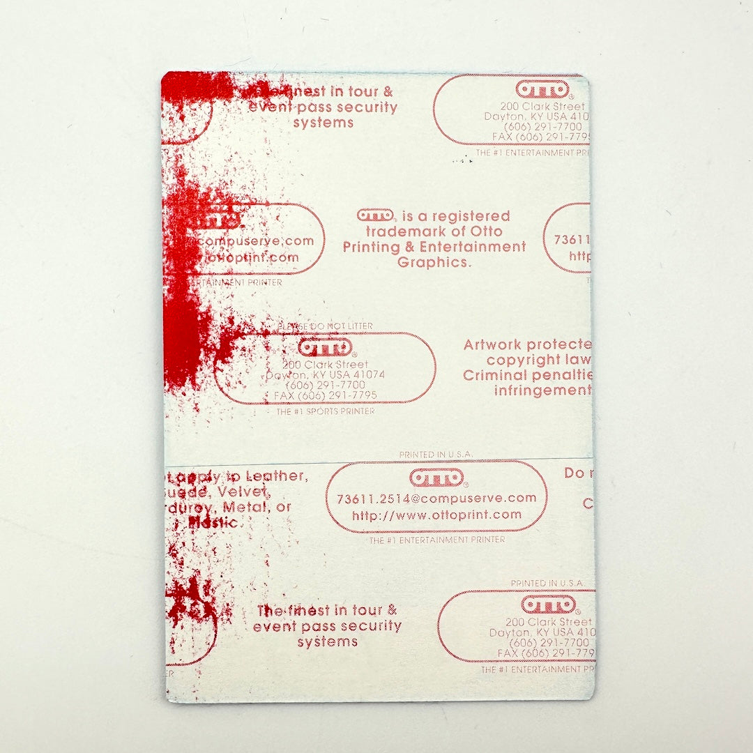 Backside of pass showing intact paper backing and mint condition. 