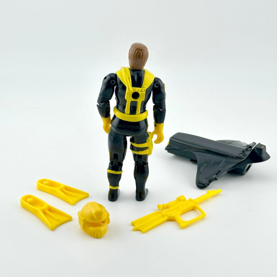 Toy figure with accessories on a white background