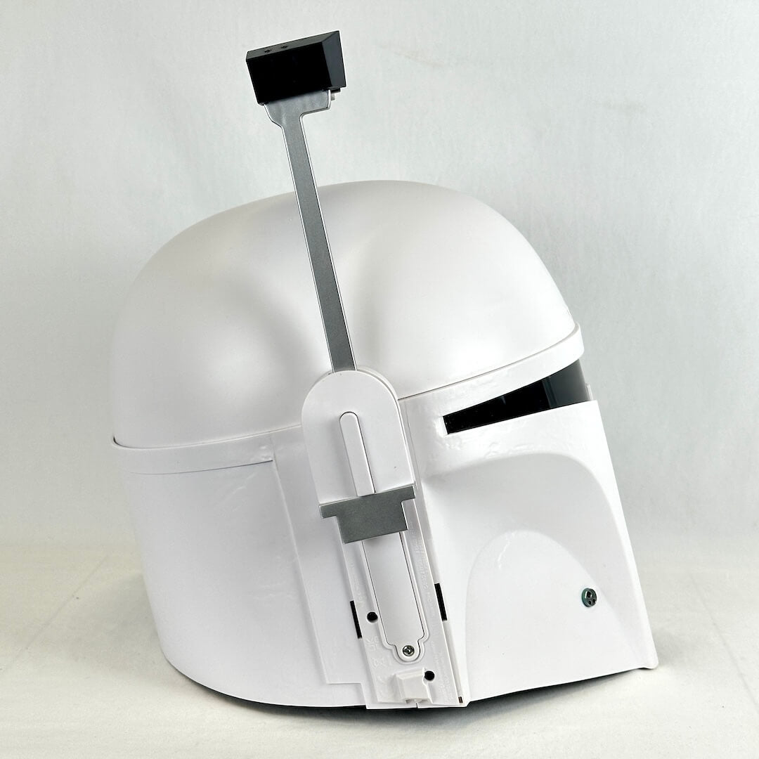 A white replica helmet inspired by Boba Fett from Star Wars, photographed against a neutral light gray background.