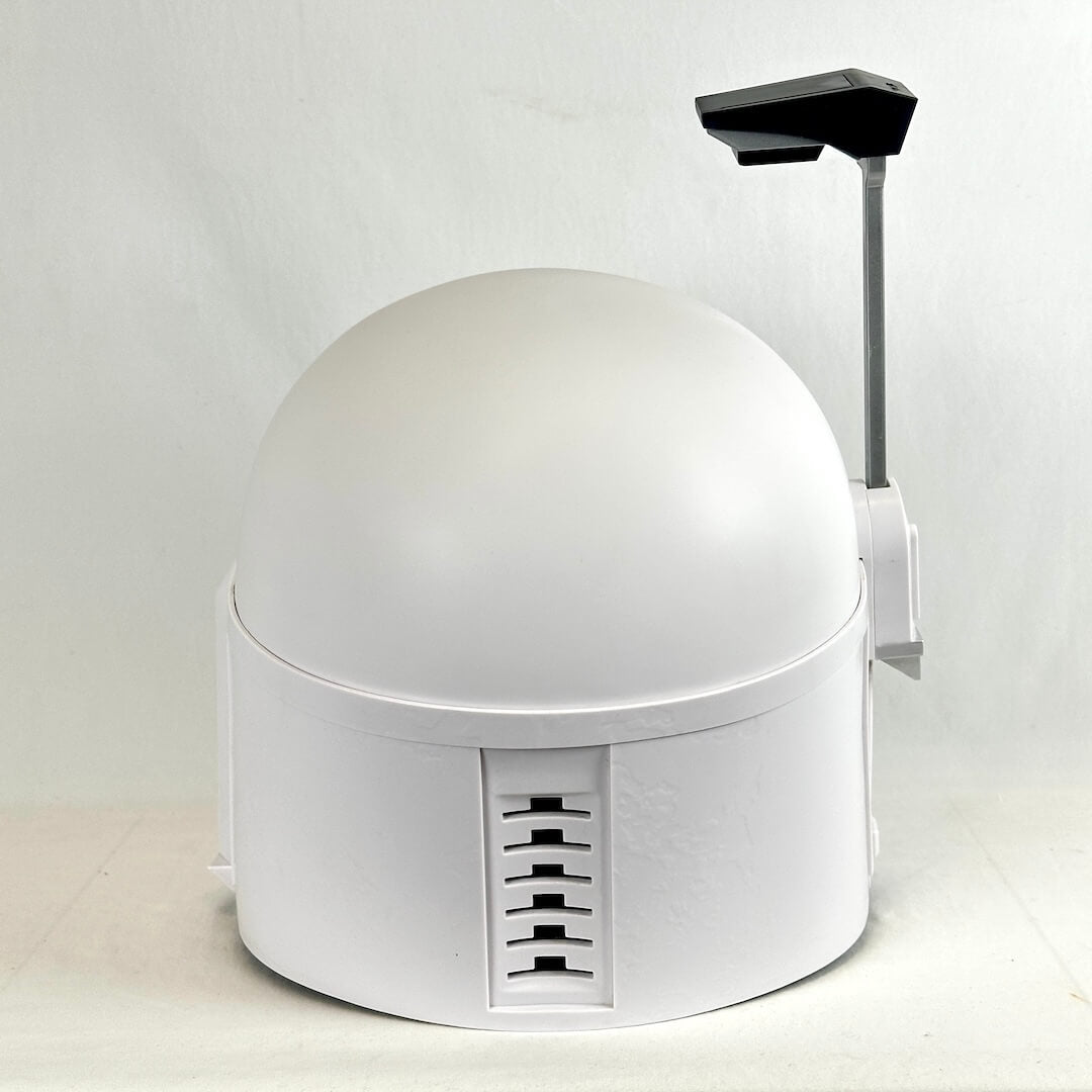 Back view of white Boba Fett helmet with antenna attachment on side, photographed on light background.