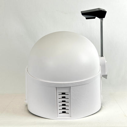 Back view of white Boba Fett helmet with antenna attachment on side, photographed on light background.