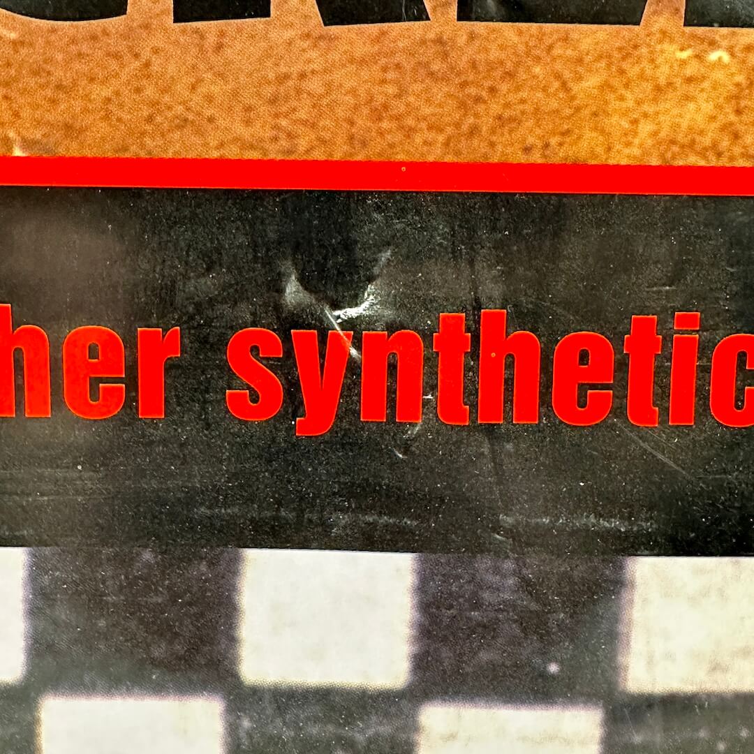 Dent at bottom center of poster. 