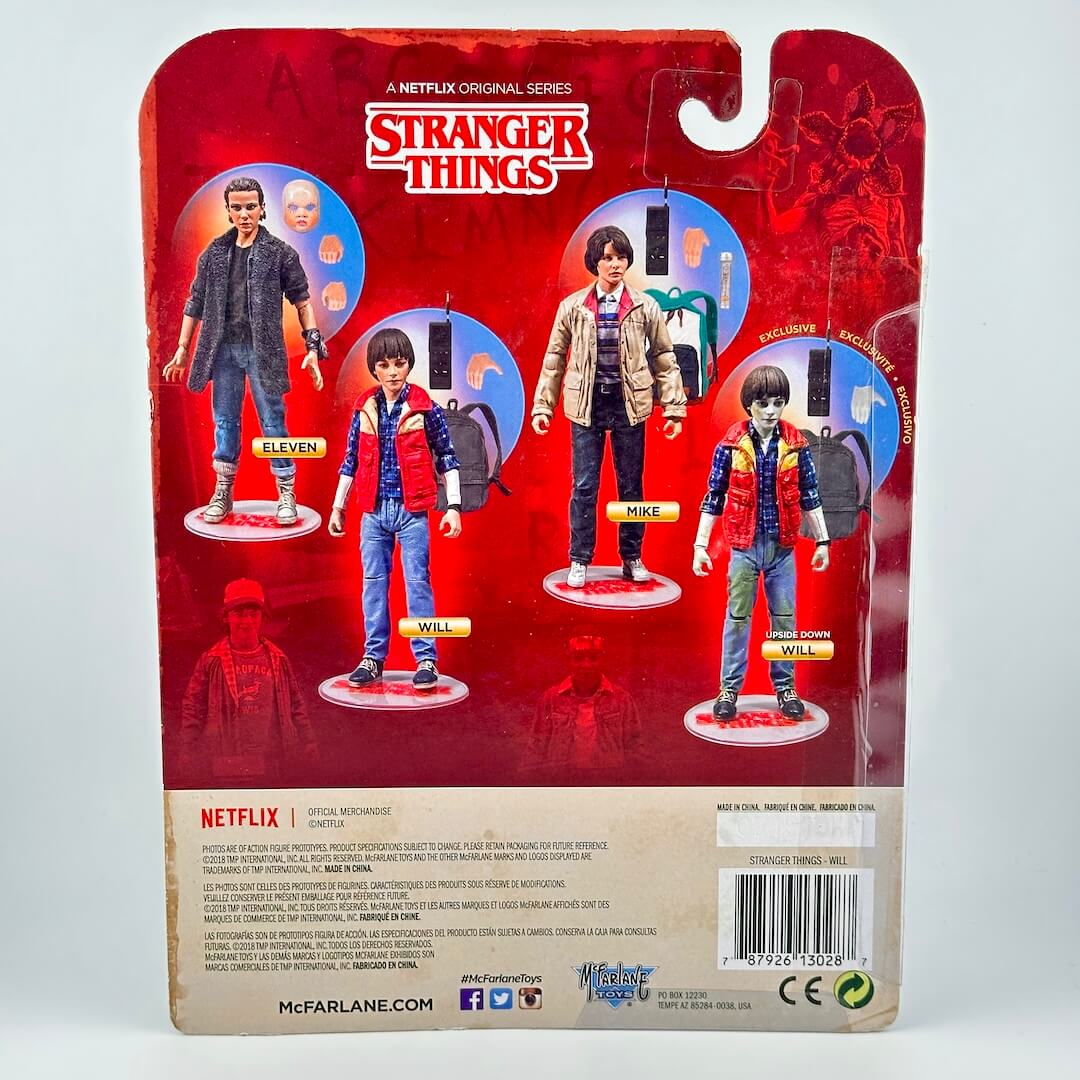 Back of a Stranger Things action figure blister card showing four collectible figures.