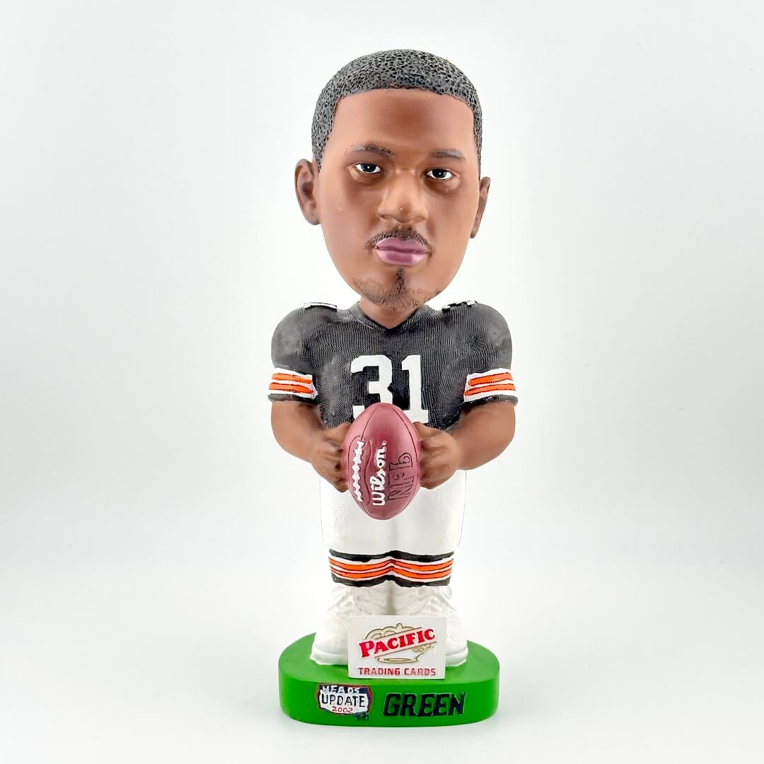 Bobblehead figure of a football player holding a ball on a white background