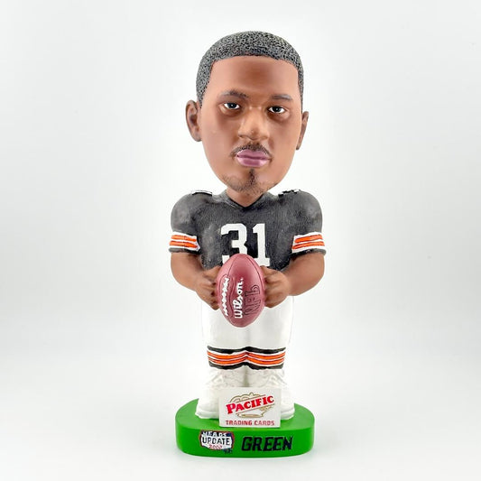 Bobblehead figure of a football player holding a ball on a white background
