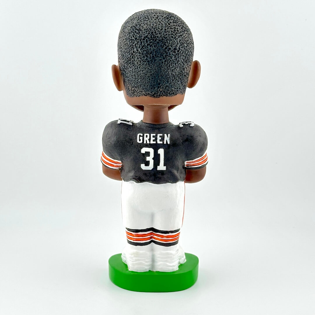 Bobblehead figure of a football player in a black jersey with 'Green 31' on a white background