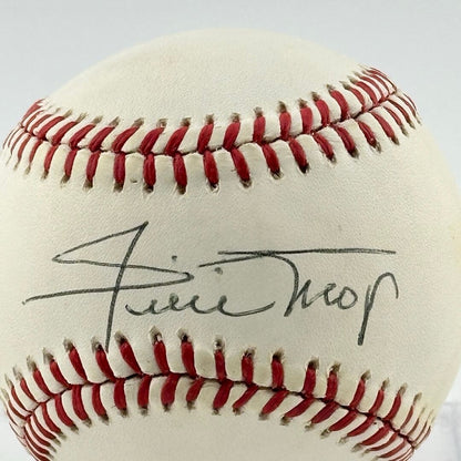 Close up of black pen signature in narrow section between red stitching, the "sweet spot." 