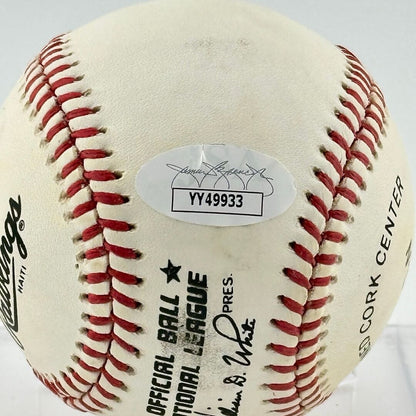 Close up of JSA authentication sticker next to MLB ball information stamp.