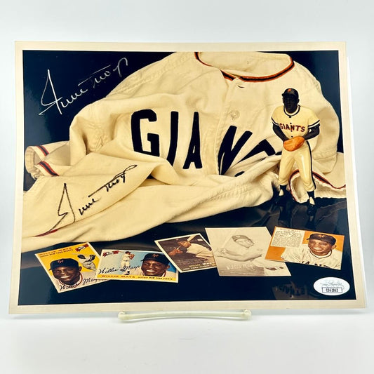 Photograph of memorabilia collage featuring signature of player, JSA authentication sticker in corner. 
