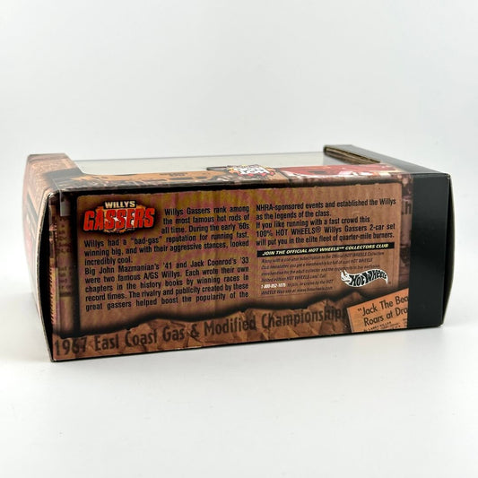 A boxed collectible model car shown from the back, featuring printed text panels. 