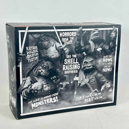 Box featuring black and white illustrations of monsters with text on a gray background