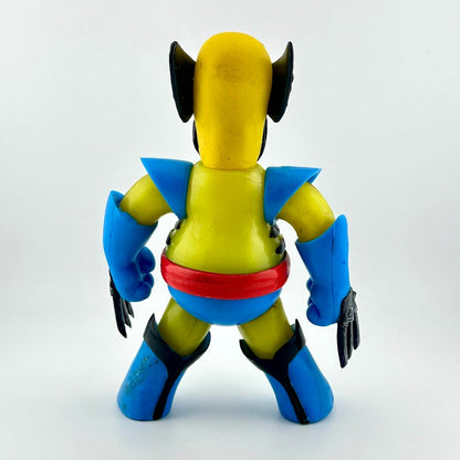 Toy figure with yellow, blue, and red colors on a white background