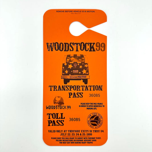 Orange Woodstock 99 Transportation Pass  with black text and image of VW bus in center. 