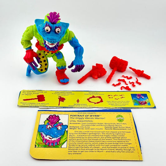 TMNT action figure with accessories and character card against white background. 