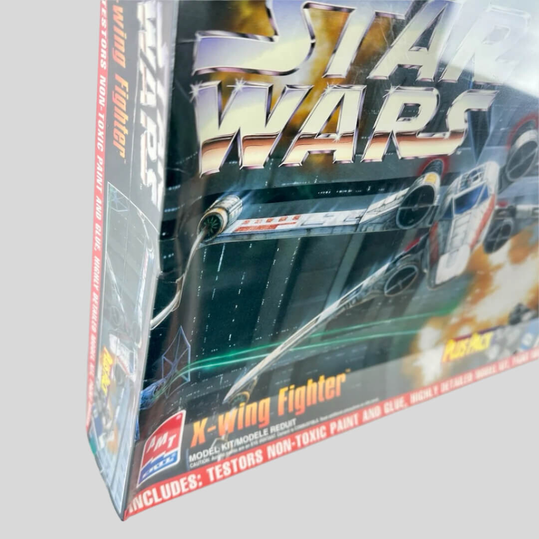 View of left side where the box is caved in under plastic. 