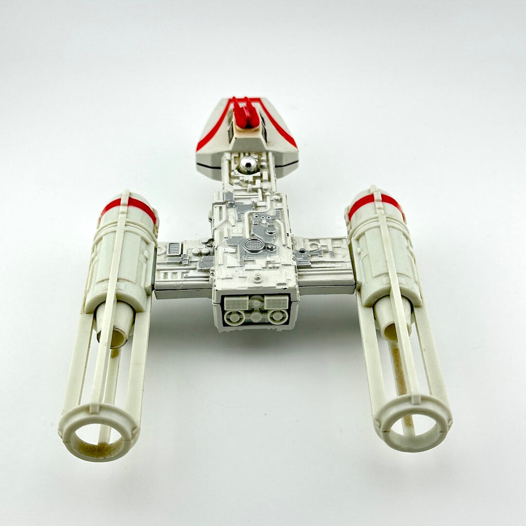 Toy model of a spaceship on a white background