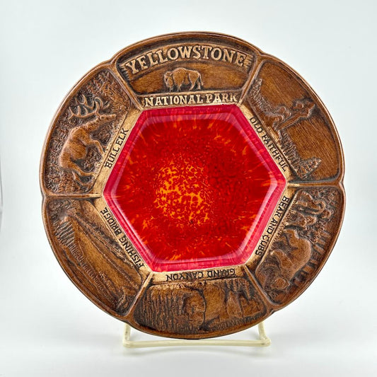 Decorative plate with Yellowstone National Park design on a white background