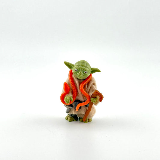 Yoda action figure with all accessories against white background.