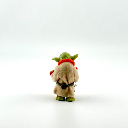 Yoda action figure with all accessories against white background.