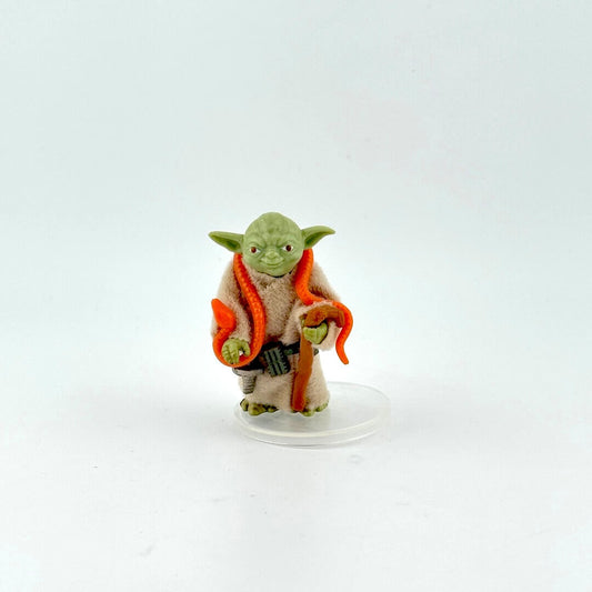 Yoda action figure with all accessories against white background.