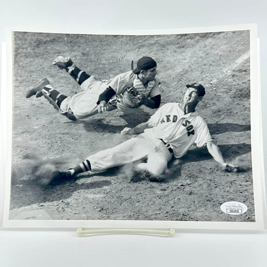 Black and white photo of two baseball players in action on a field, with a JSA authentication label at the bottom.