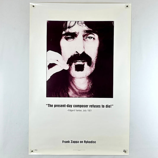 Poster of Frank Zappa with a quote on a white background