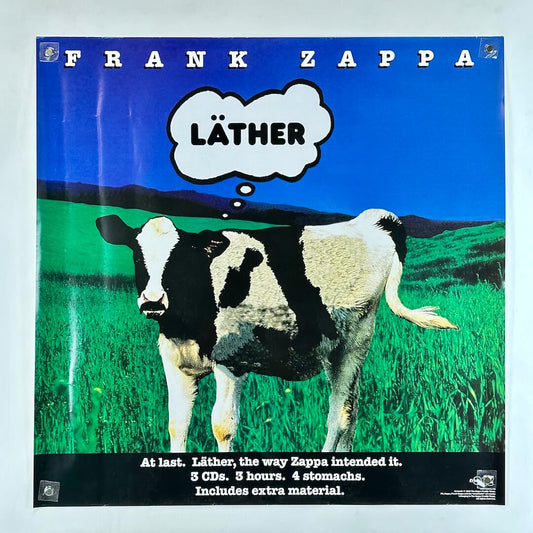 Album cover for Frank Zappa's 'Läther' with a cow in a field and thought bubble.