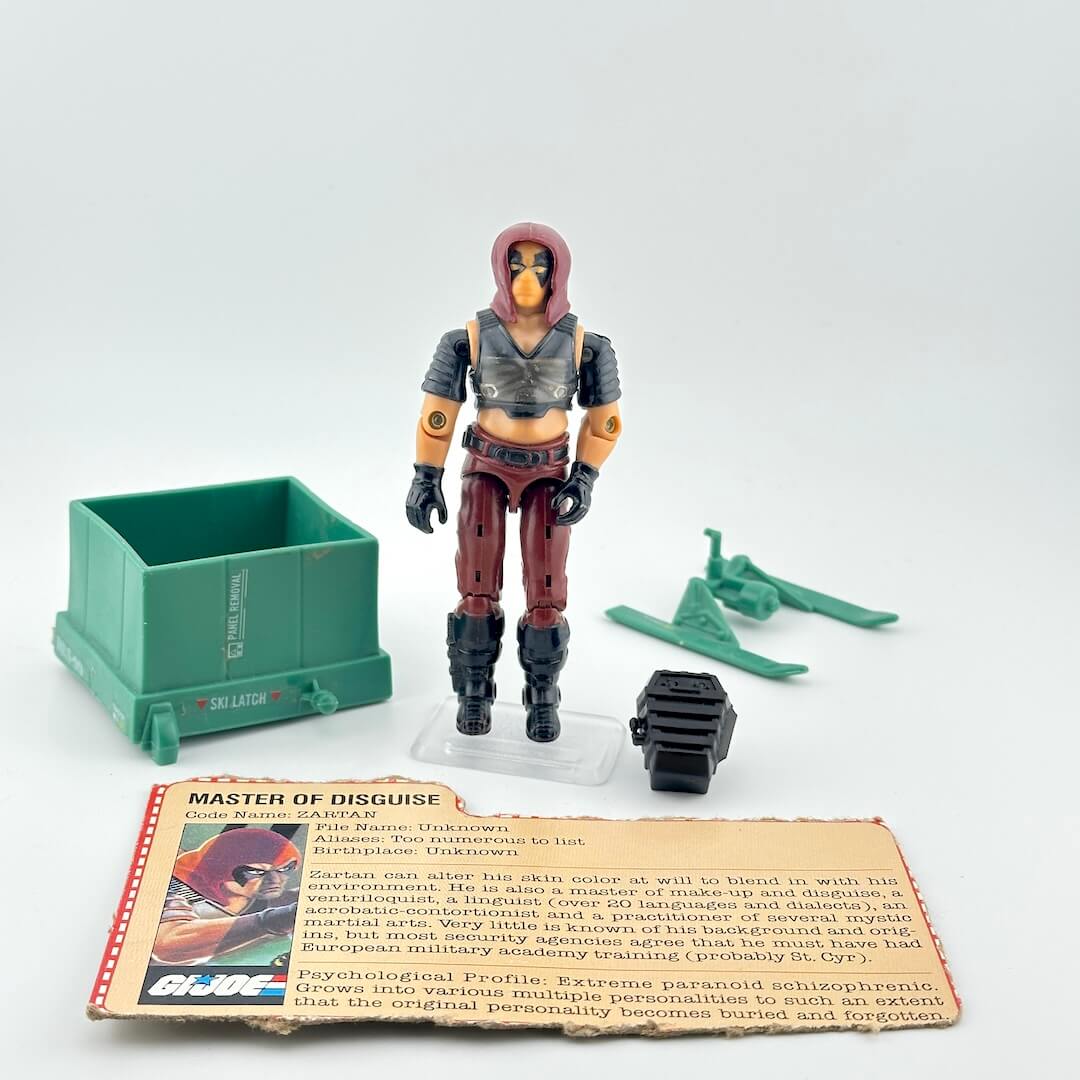 Toy figure with accessories and character card on a white background