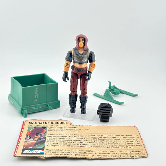 Toy figure with accessories and character card on a white background