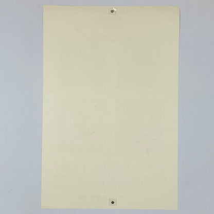 Backside of beige poster against white background. 