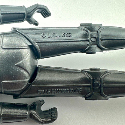 Close-up of back of figure's legs to show COO and copyright information. 