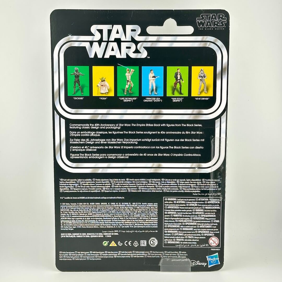 Back of Star Wars action figure packaging showing other figure images and product information. 