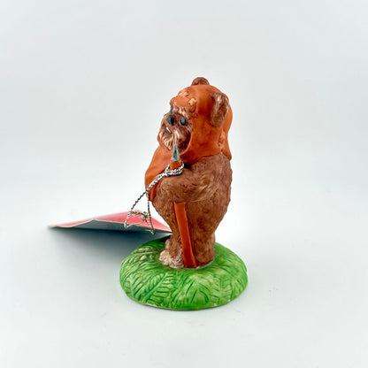 Star Wars Ewok figurine with a red 'Return of the Jedi' tag on a white background